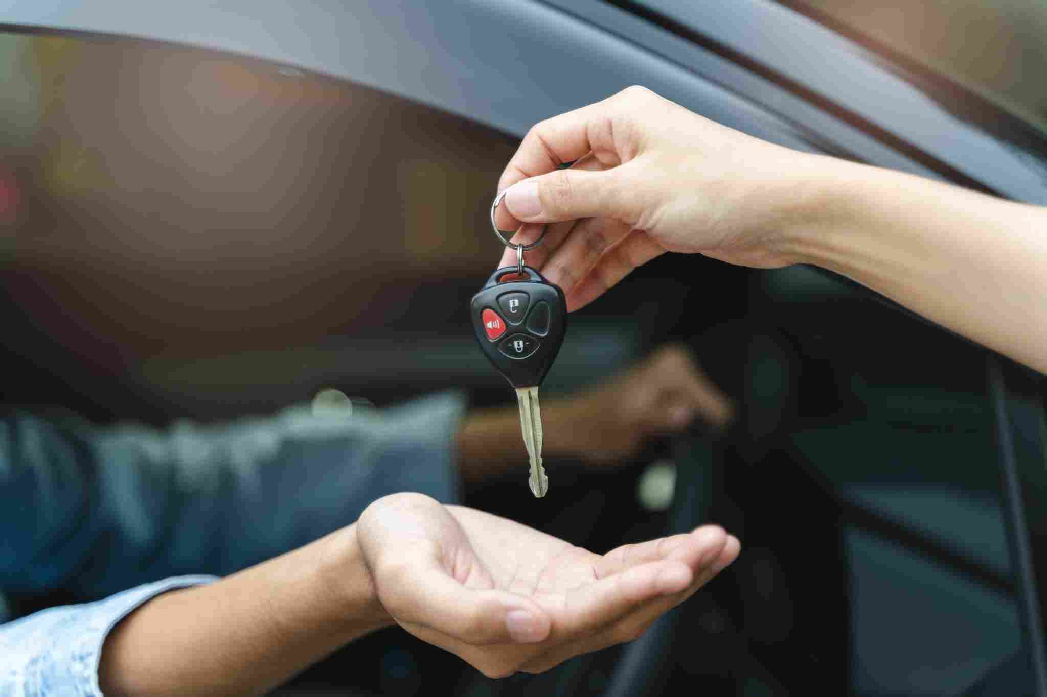Handing over a car key